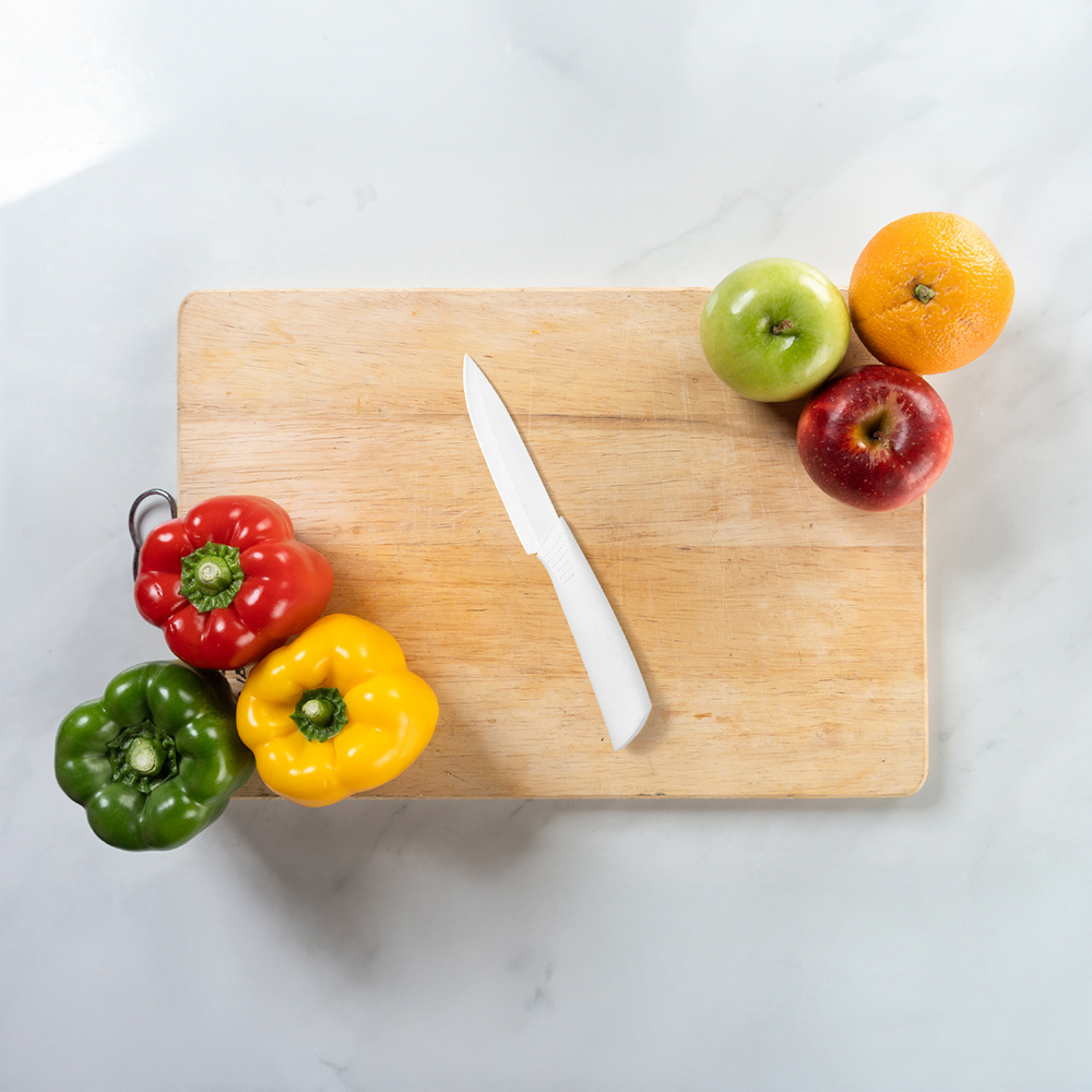 09530 coltello da cucina in ceramica bianco lama 10cm con manico pvc e fodero 6 Rasoigoodfellas Coltello da cucina in ceramica bianco Lama 10cm con Manico PVC e fodero - immagine 6